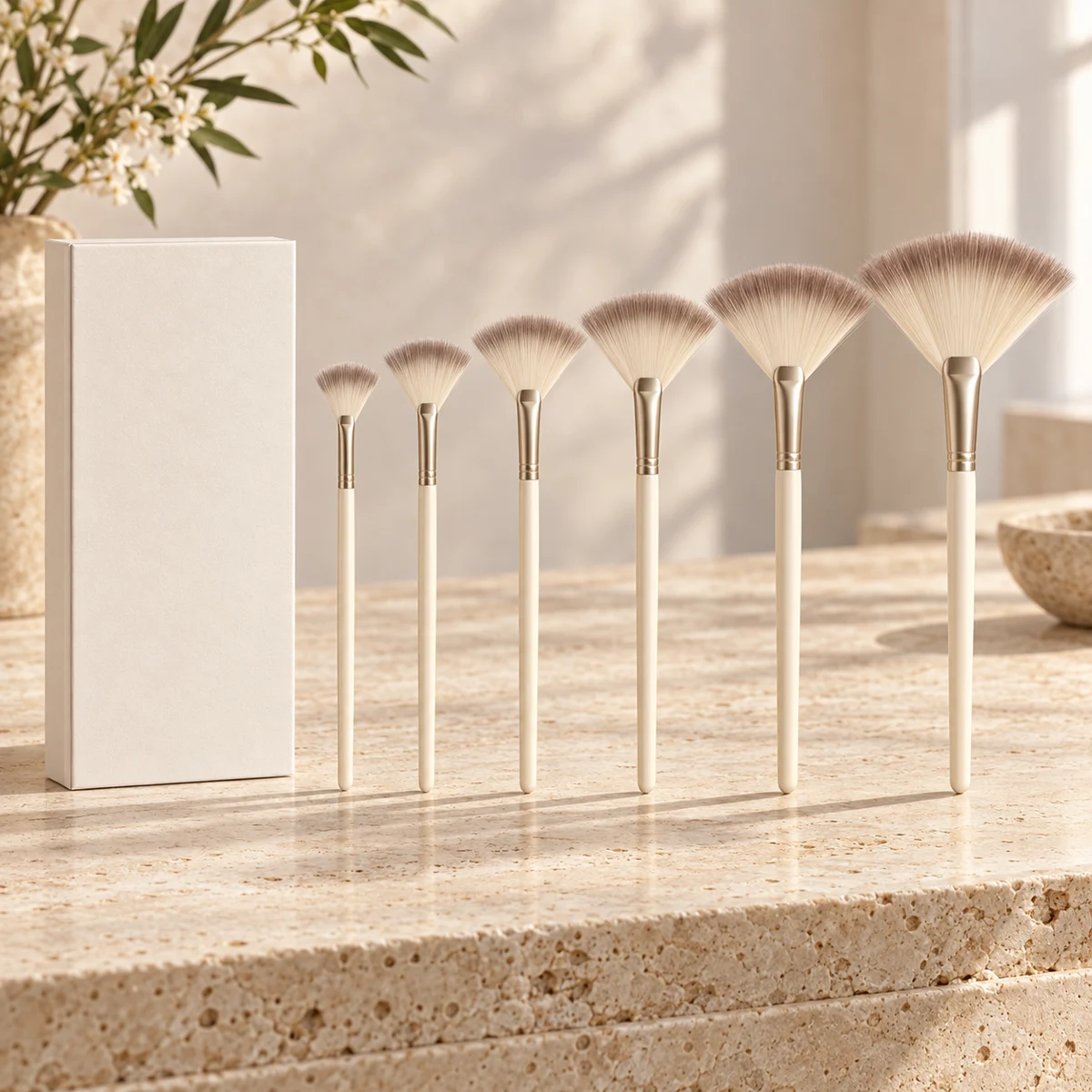 Crème Studio Six Fan Highlight Brush Set — Cream handle / taupe-tipped ivory bristles fan highlight brush design