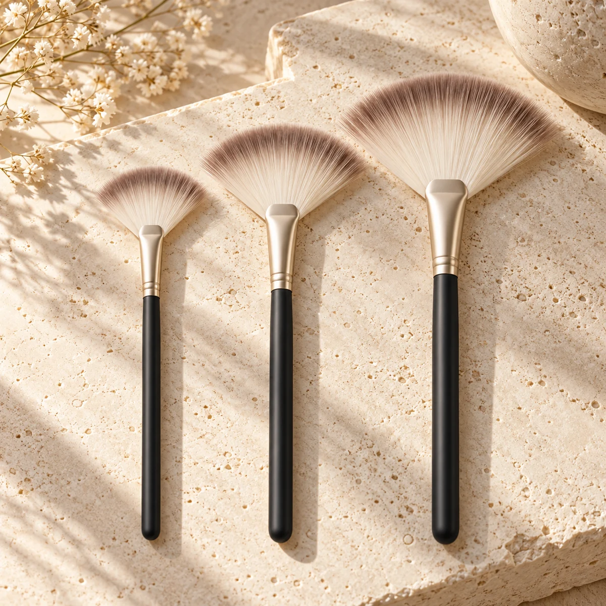 Noir Sculpt Trio Fan Highlight Brush Set — Charcoal handle / taupe-tipped ivory bristles fan highlight brush design