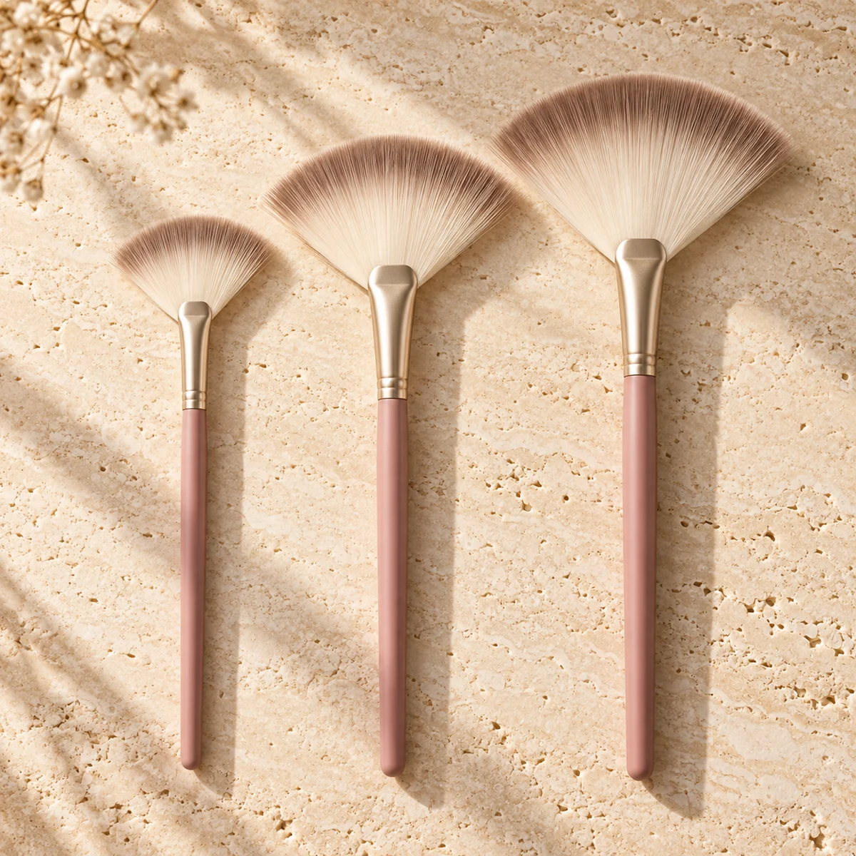Rose Sculpt Trio Fan Highlight Brush Set — Dusty rose handle / taupe-tipped ivory bristles fan highlight brush design